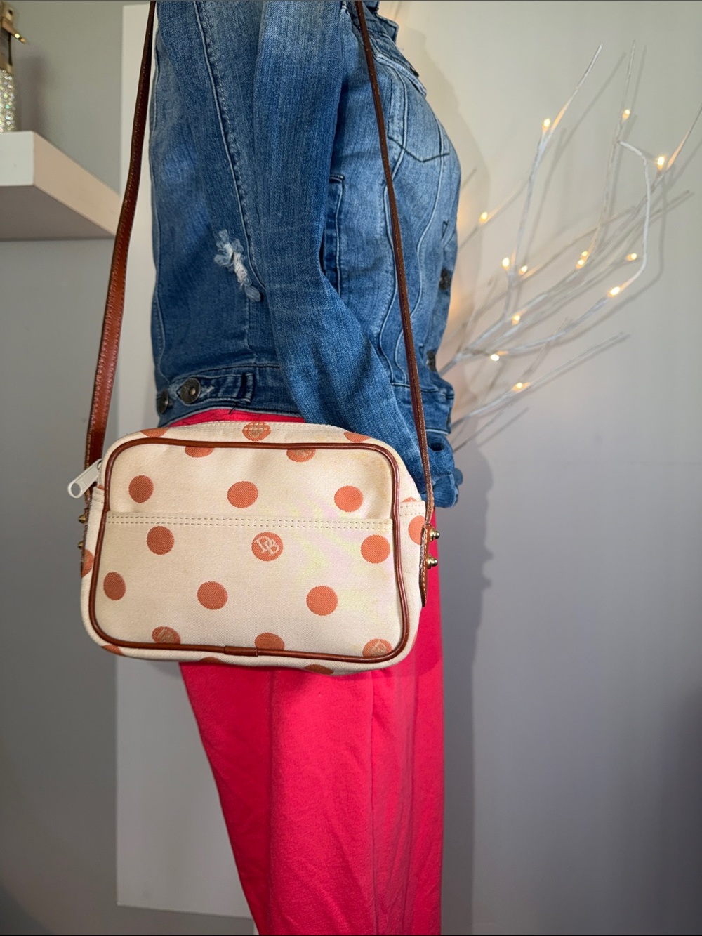 Dooney & Bourke dad logo shoulder bag. Canvas with leather trim size 8 x 4 appx